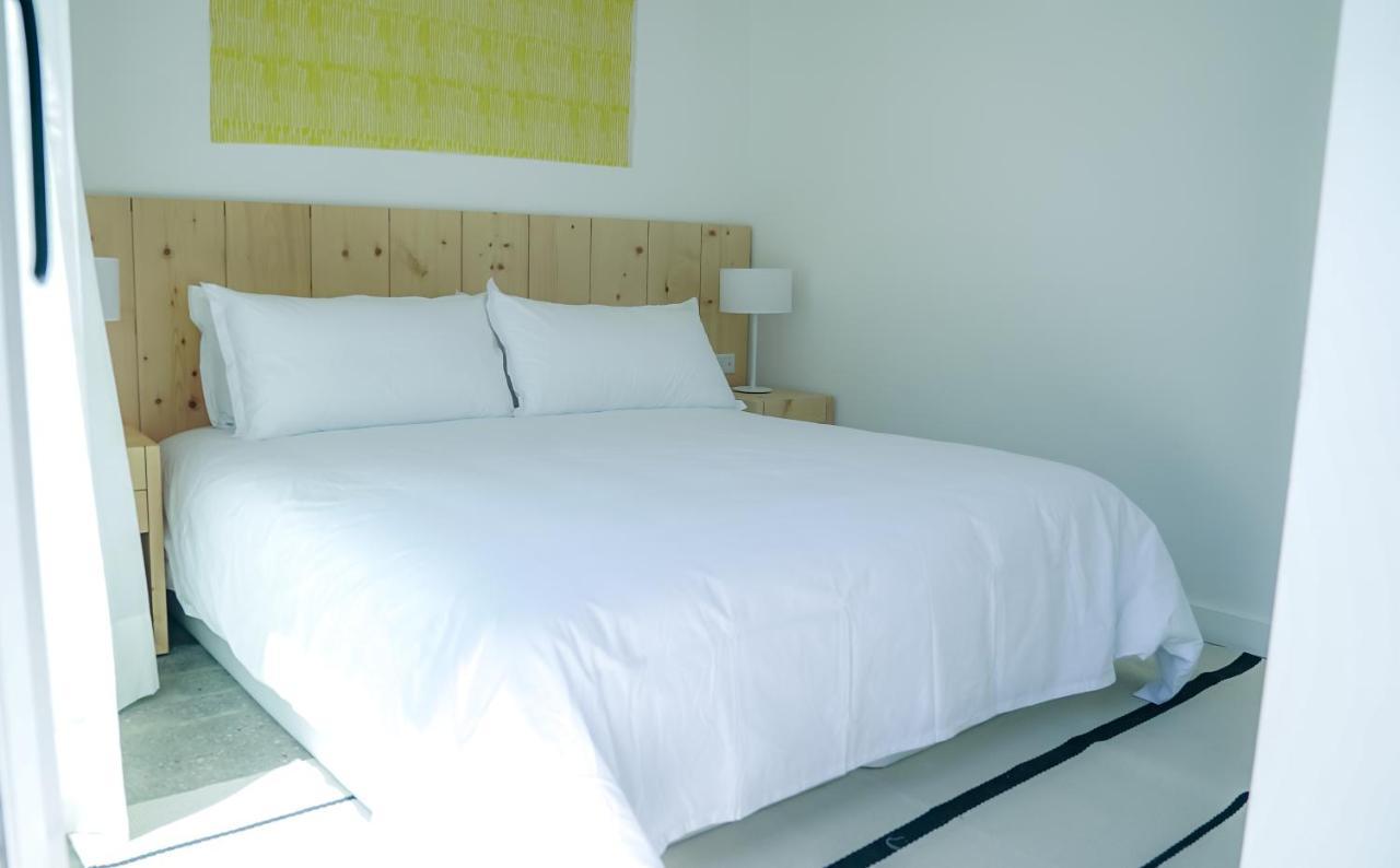 Casagrande Hotel&Beach Club José Ignacio Exterior foto A bed with a duvet