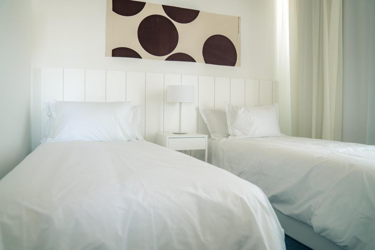 Casagrande Hotel&Beach Club José Ignacio Exterior foto A bedroom with two single beds